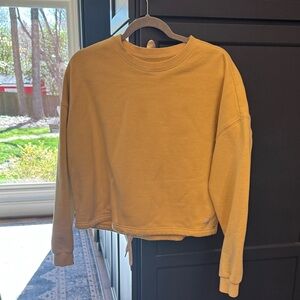Vuori sweatshirt, yellow in good condition